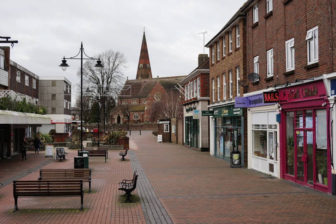 Church Walk, Burgess Hill, with St John's church beyond. The town centre sits inside the one-mile area the figures cover