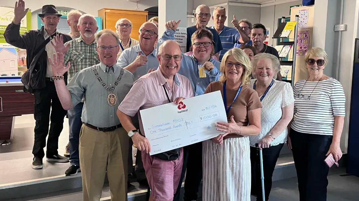 Summerhaven Mental Health Support Group receives a £1,000 cheque from Burgess Hill Town Council in the previous grants round